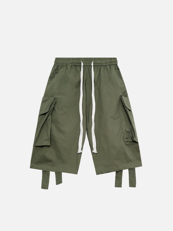 Front view of green woven ribbon shorts with large pockets by TALISHKO, perfect for warm days.