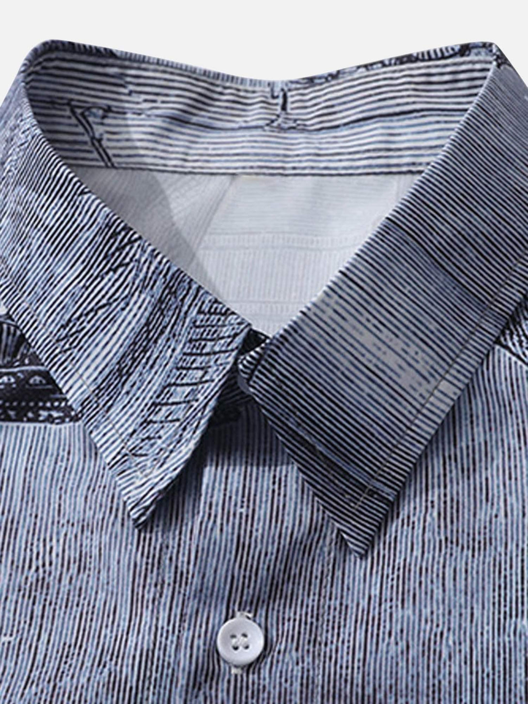 Texture and pattern showcased on TALISHKO's The Last Supper printed shirt collar detail.