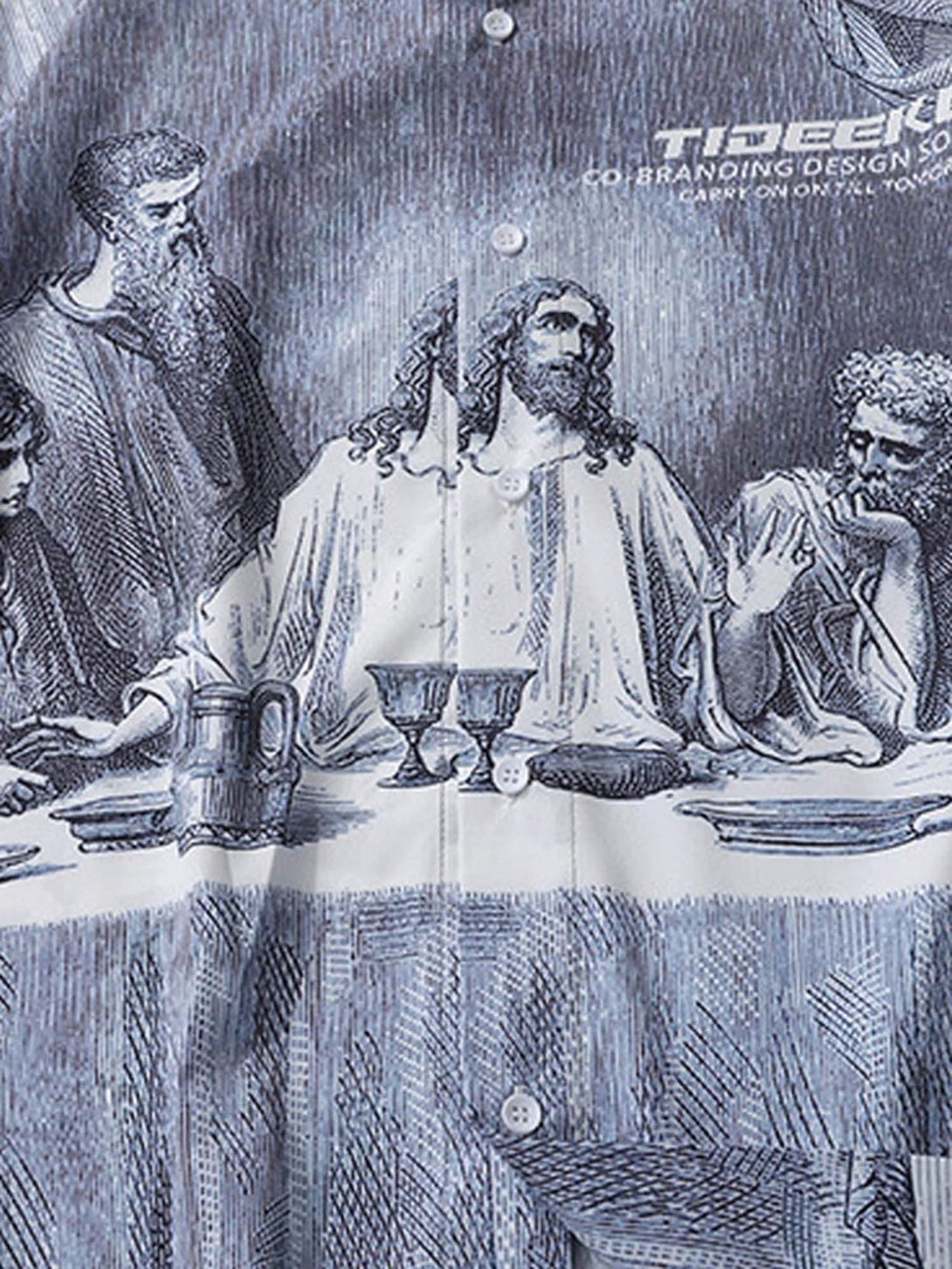 A detailed view of The Last Supper print on a shirt by TALISHKO, emphasizing unique design.