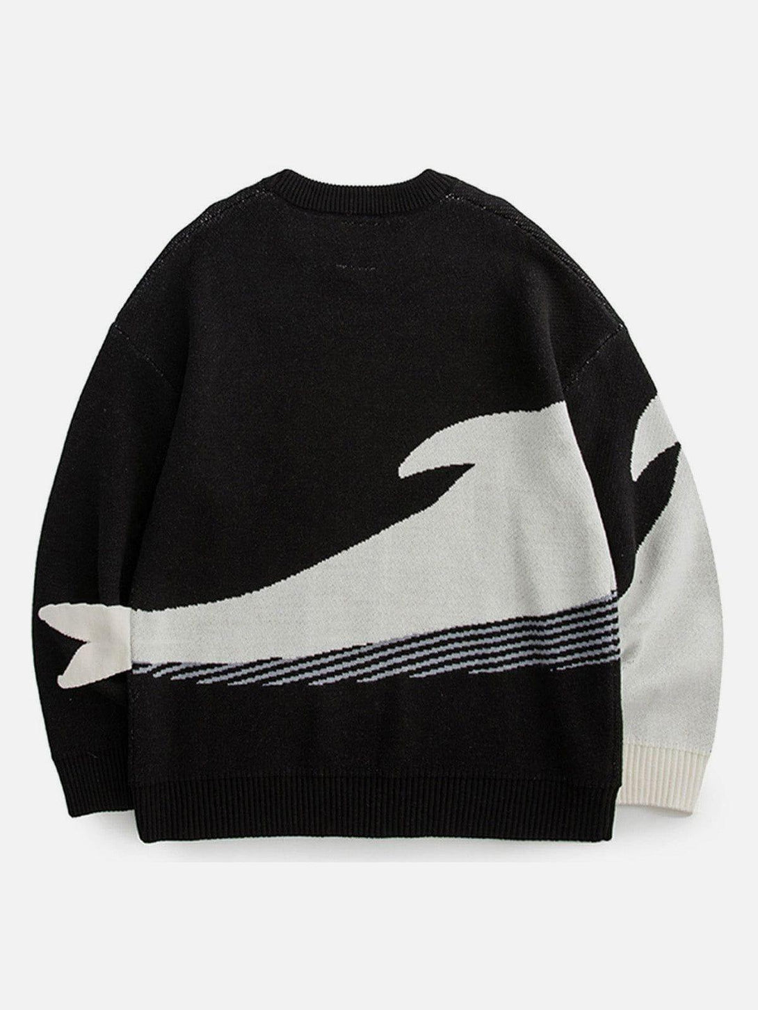 Back view of the TALISHKO knit sweater with a striking whale design in black and white.