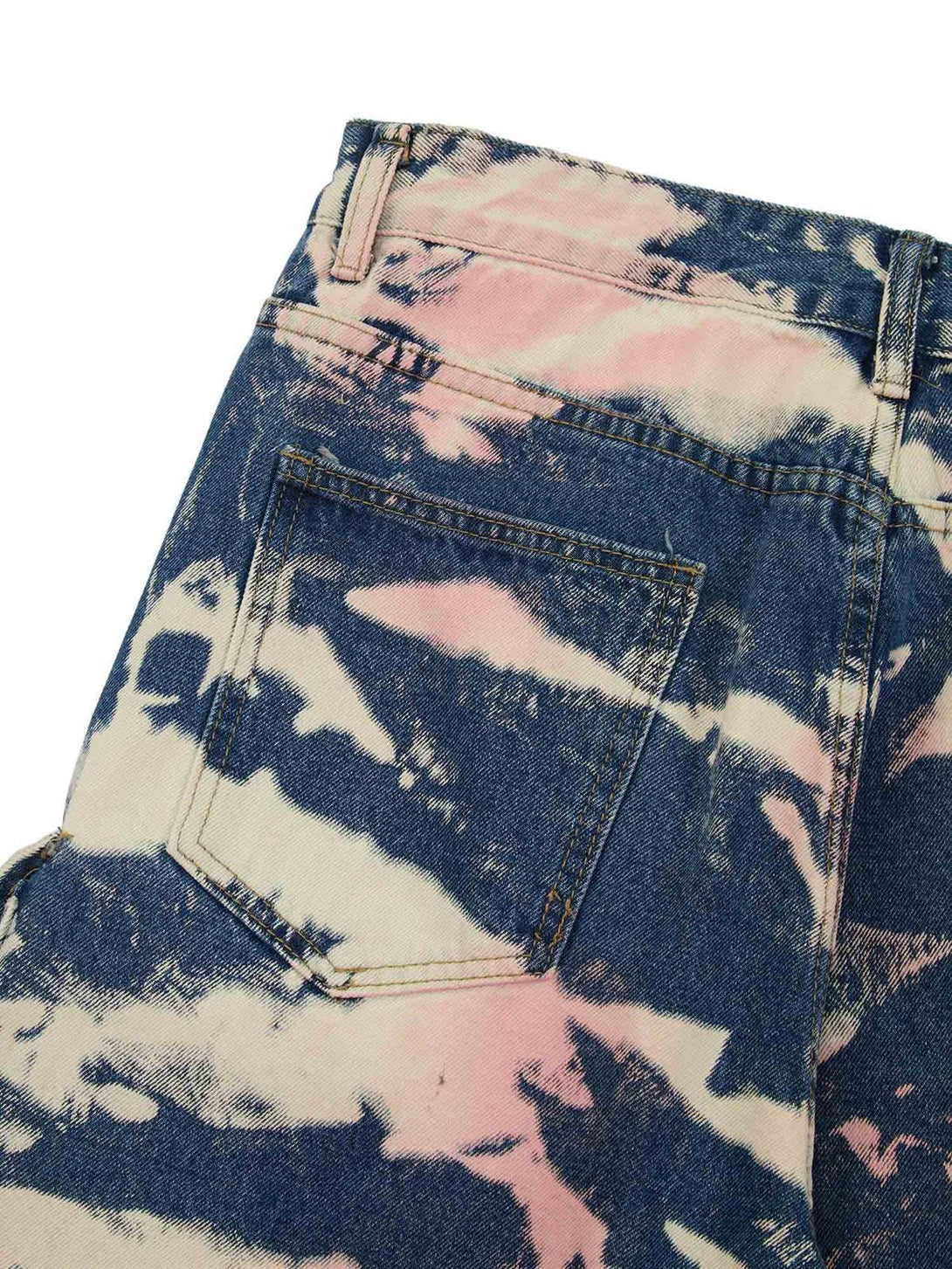 Texture and pattern showcased on TALISHKO tie-dye camouflage cargo jeans with pink and blue hues.