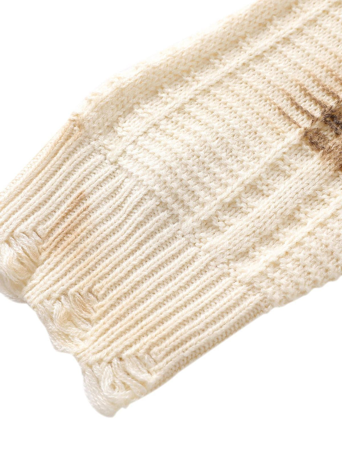 Ribbed cuff detail of a tie-dye sweater by TALISHKO, highlighting its intricate knit design.