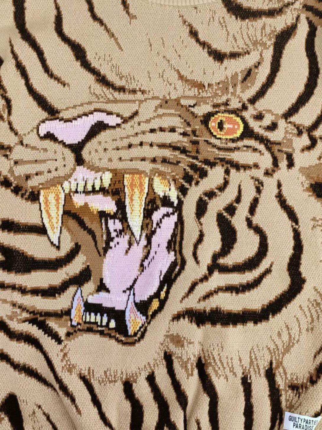 Focusing on the fierce tiger design, this TALISHKO crew neck sweater highlights intricate knit details.