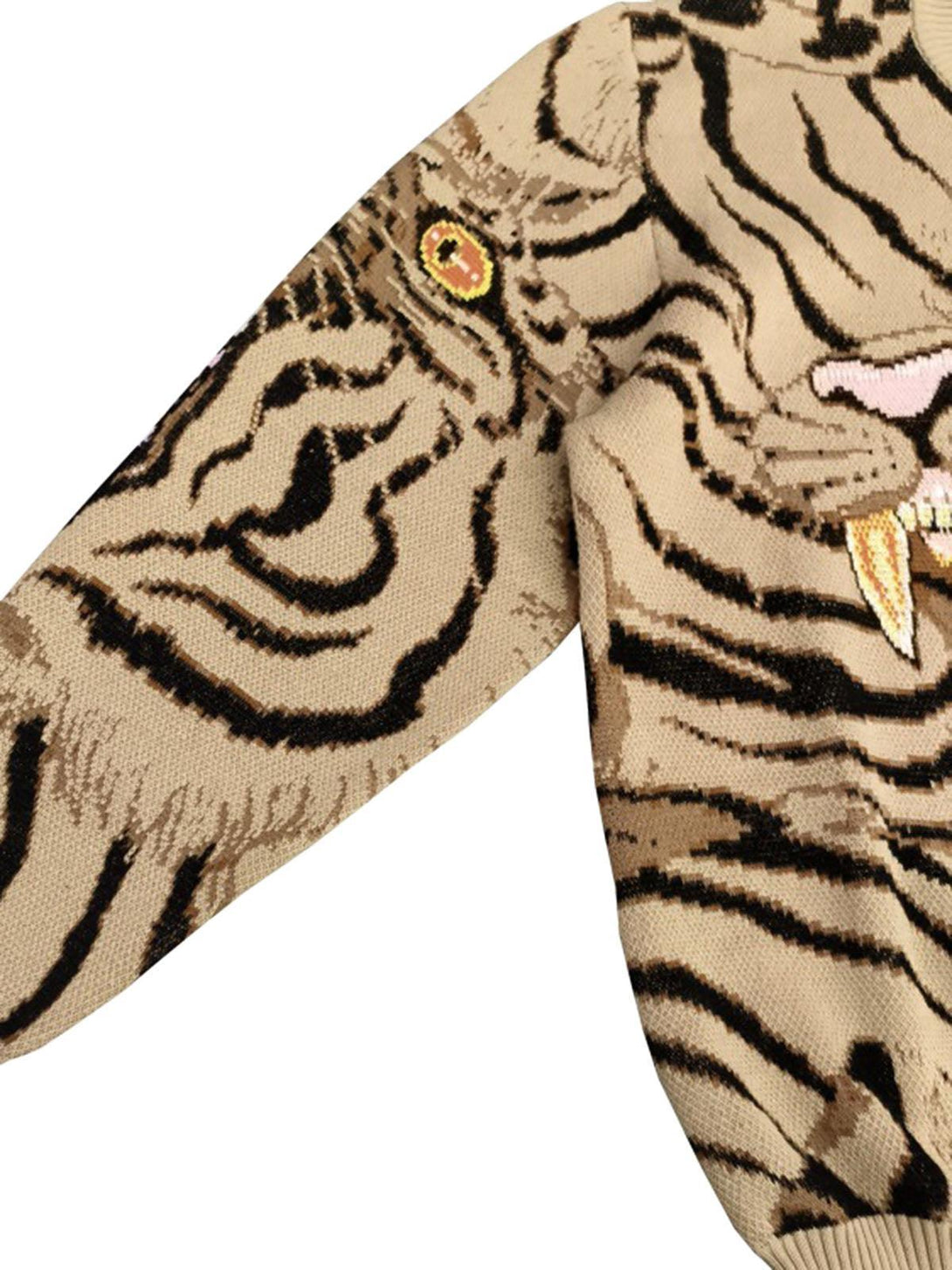 TALISHKO's knitted sweater showcases a detailed tiger pattern on the sleeve, highlighting bold style.