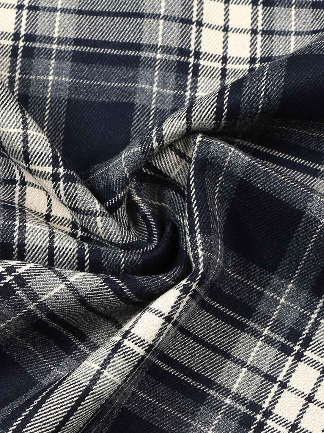 Intricate plaid fabric texture showcased in a towel embroidered shirt by TALISHKO.