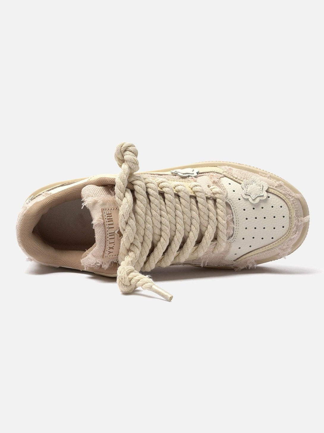 Top view of TALISHKO board shoes featuring chunky twine laces and star details.