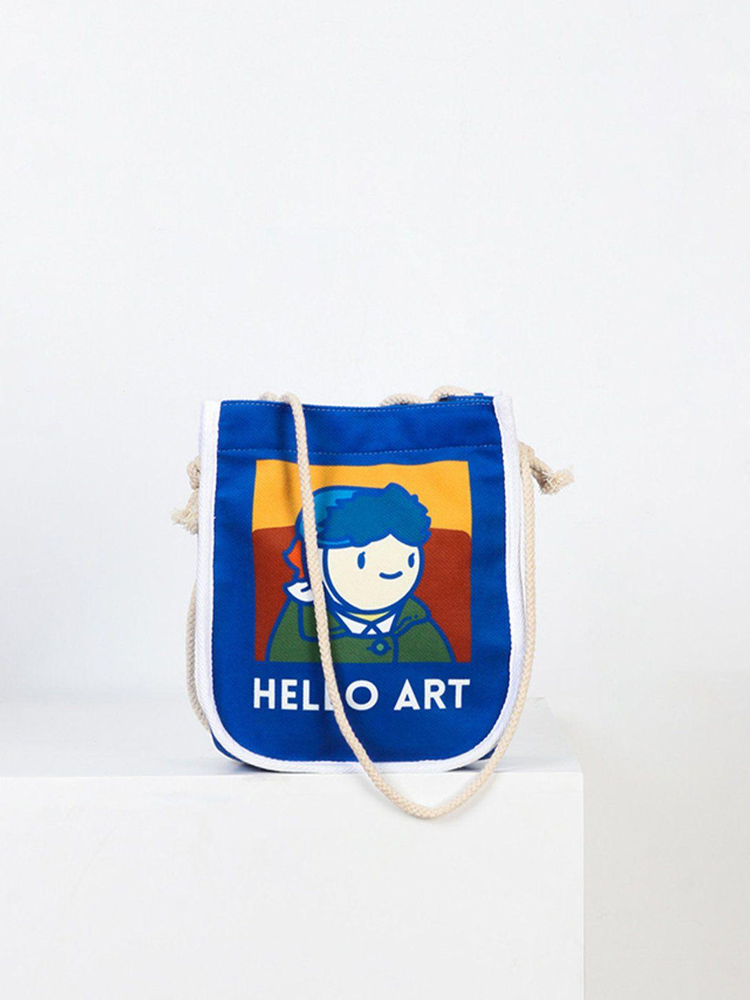A vibrant TALISHKO crossbody bag featuring a whimsical Van Gogh cartoon illustration.