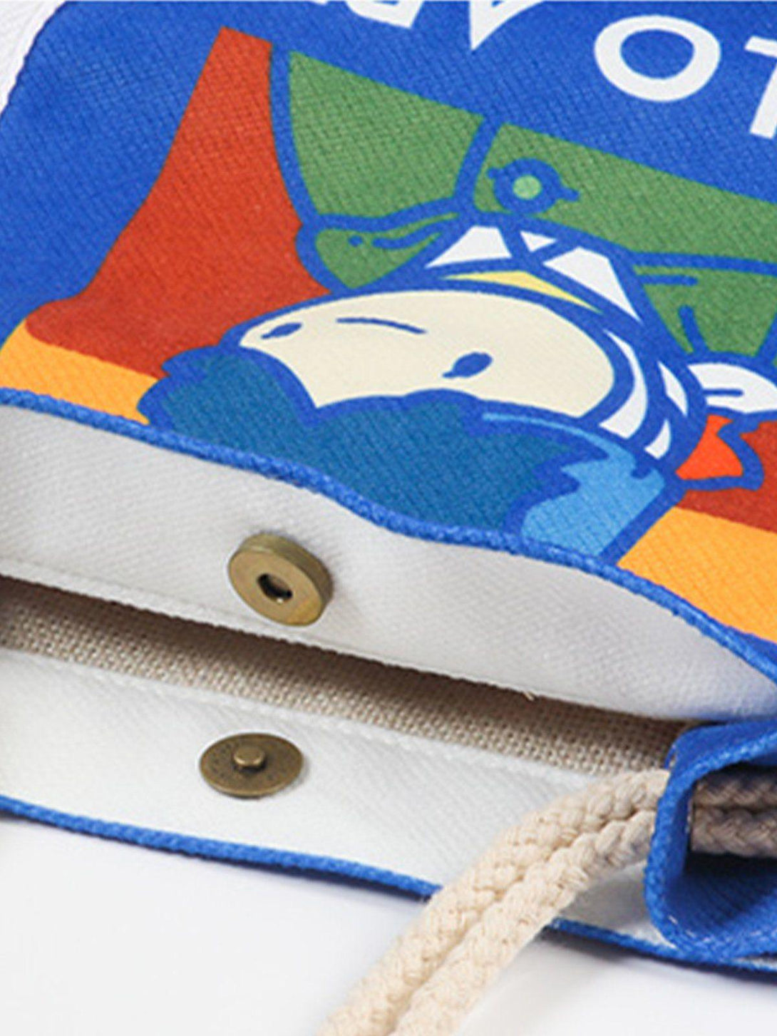 A detailed look at TALISHKO's crossbody bag, highlighting the playful Van Gogh cartoon design.
