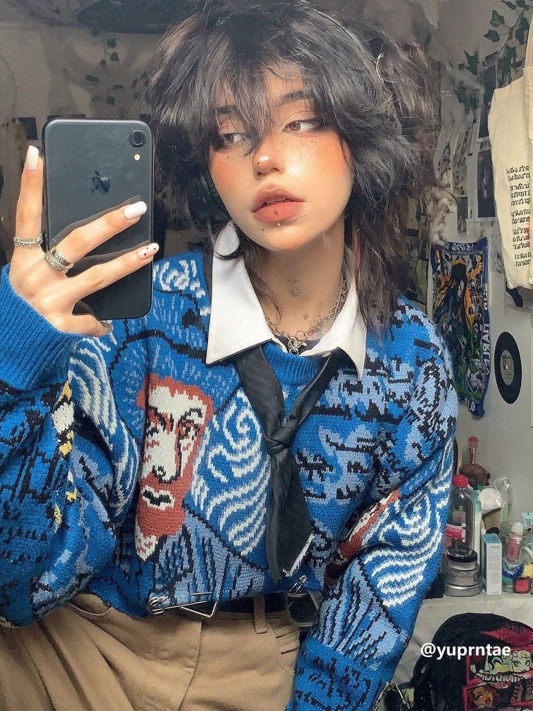 TALISHKO knit sweater with Van Gogh-inspired design, styled with a tie for a creative look.