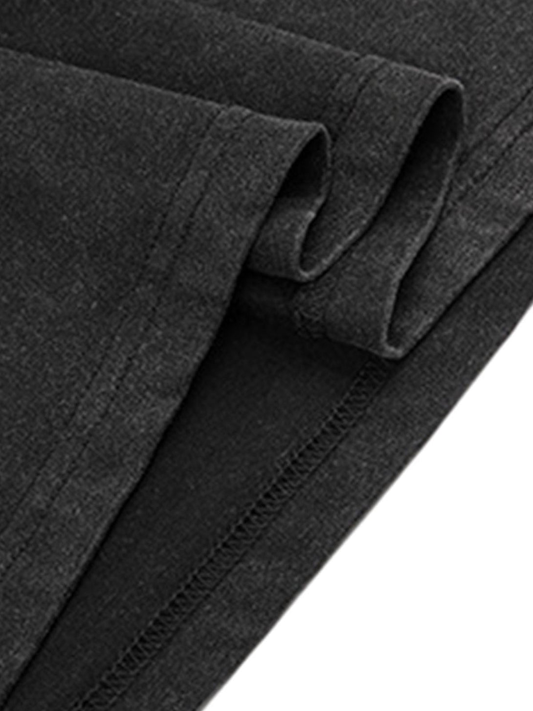 Detailed fabric and stitching of TALISHKO's vintage artistic graphic T-shirt in black.