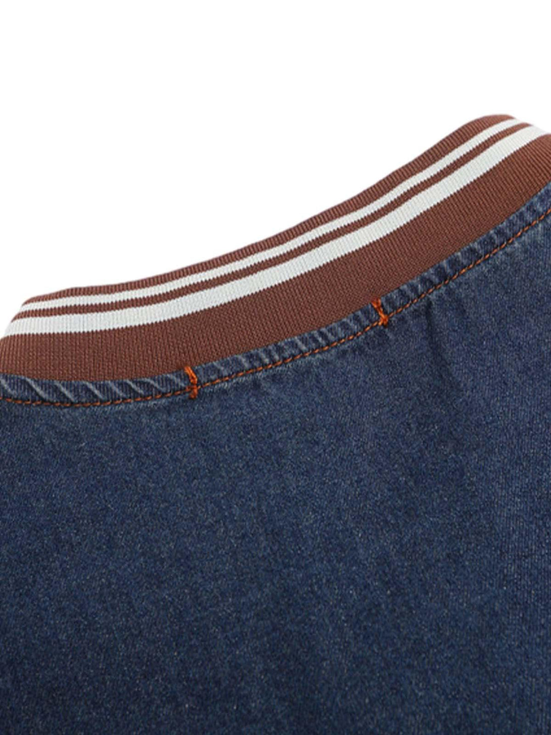 Striped collar detail on TALISHKO's vintage denim T-shirt, showcasing intricate stitching.