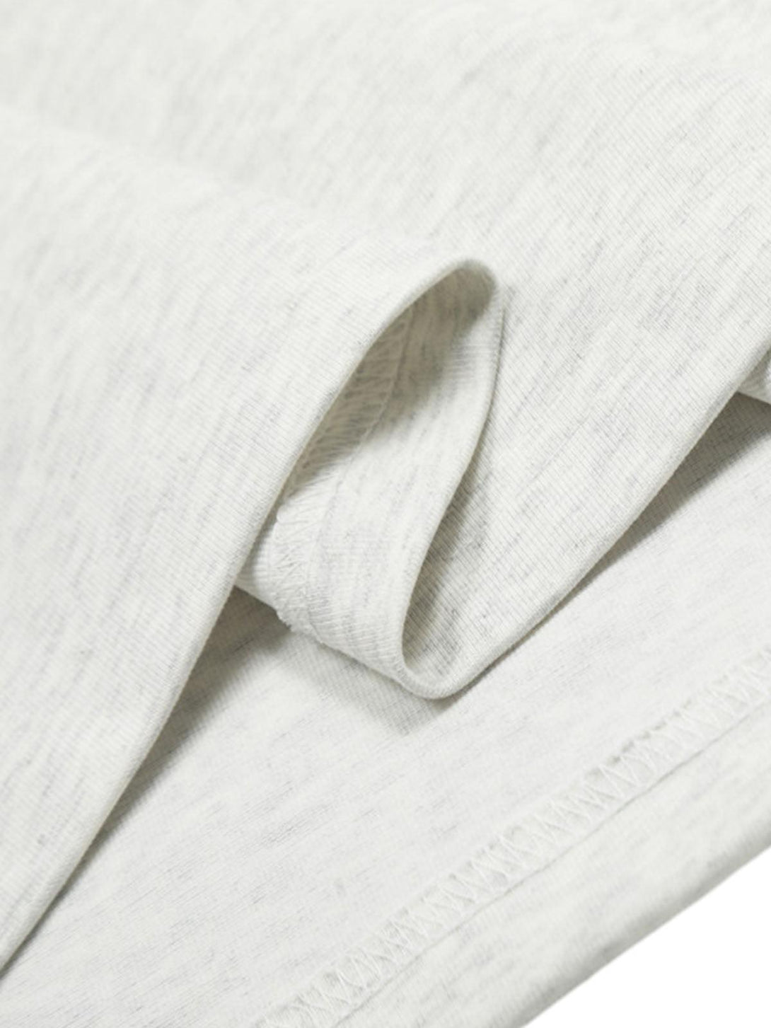 Intricate look at TALISHKO vintage Doberman T-shirt fabric, highlighting soft texture.