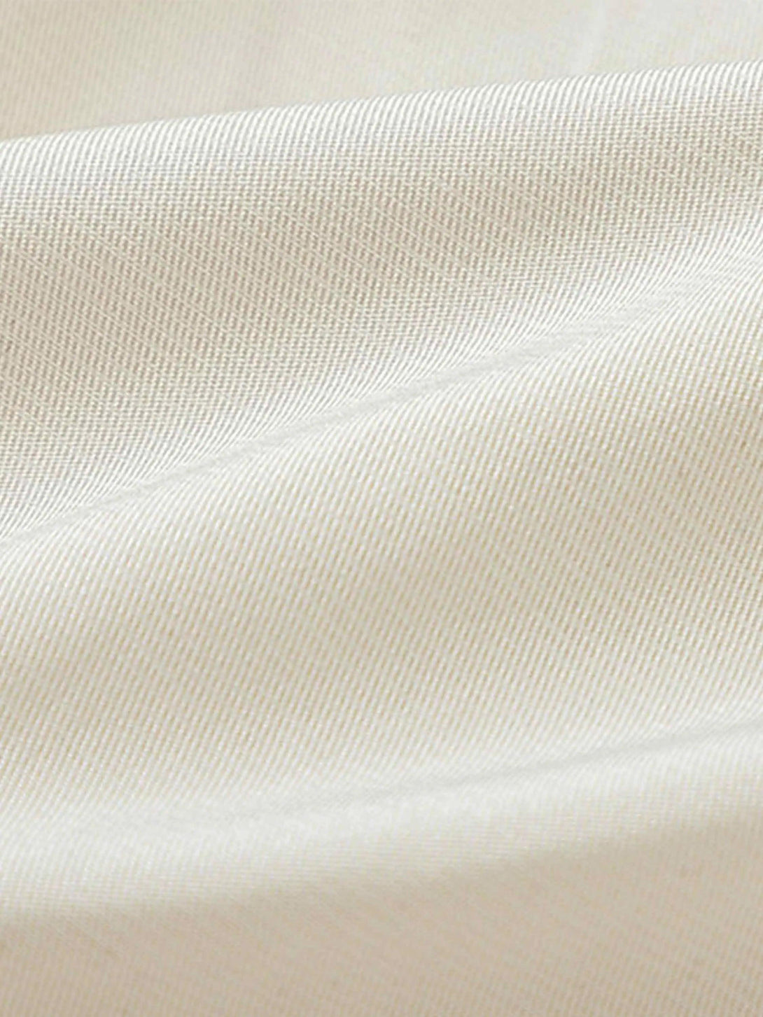 Zoomed-in texture of TALISHKO vintage shorts fabric, highlighting its fine weave detail.