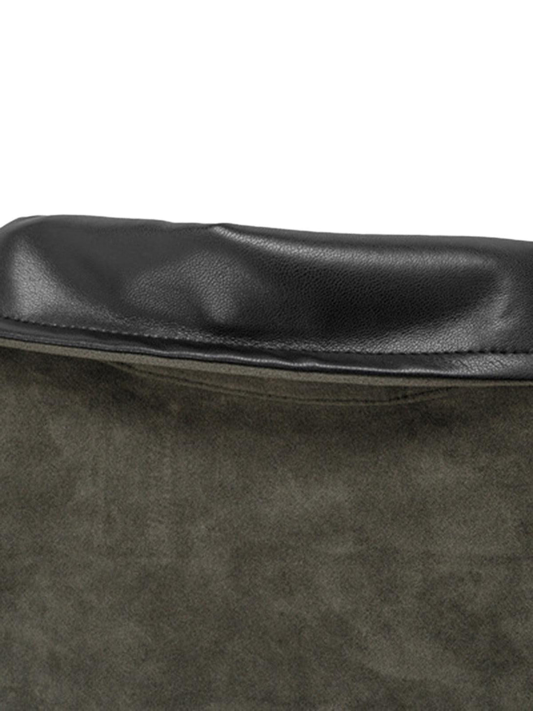 A tight crop highlighting the TALISHKO suede jacket's leather collar and textured fabric.