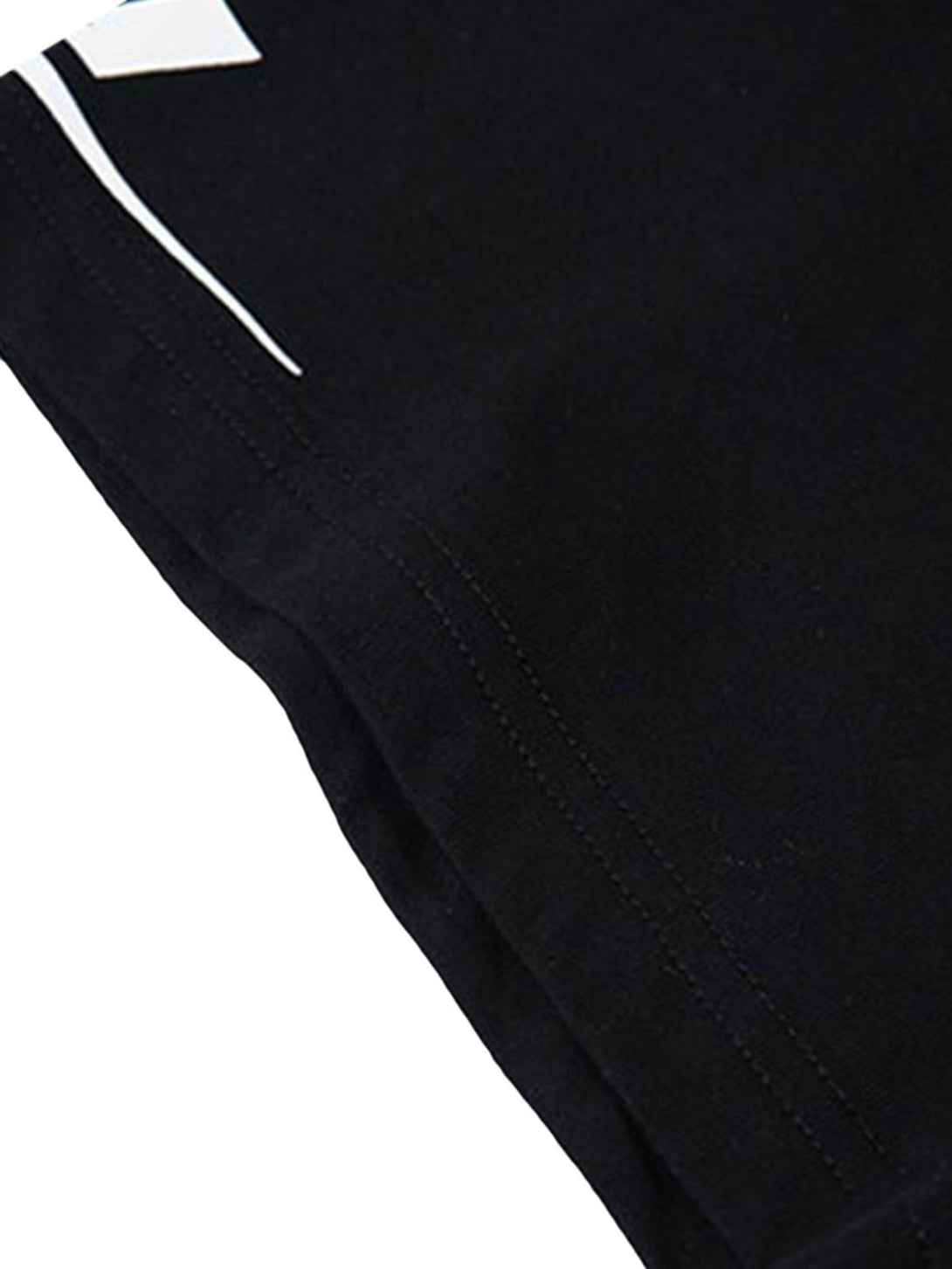 Detailed fabric and stitching on a black vintage polo shirt by TALISHKO.