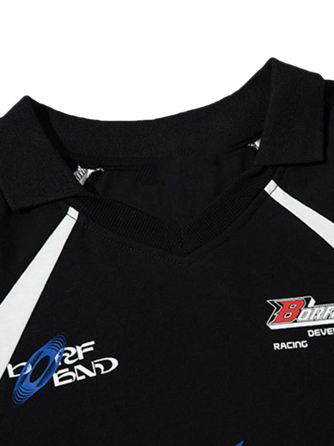 Detailed look at the graphic design on a black vintage polo shirt by TALISHKO.