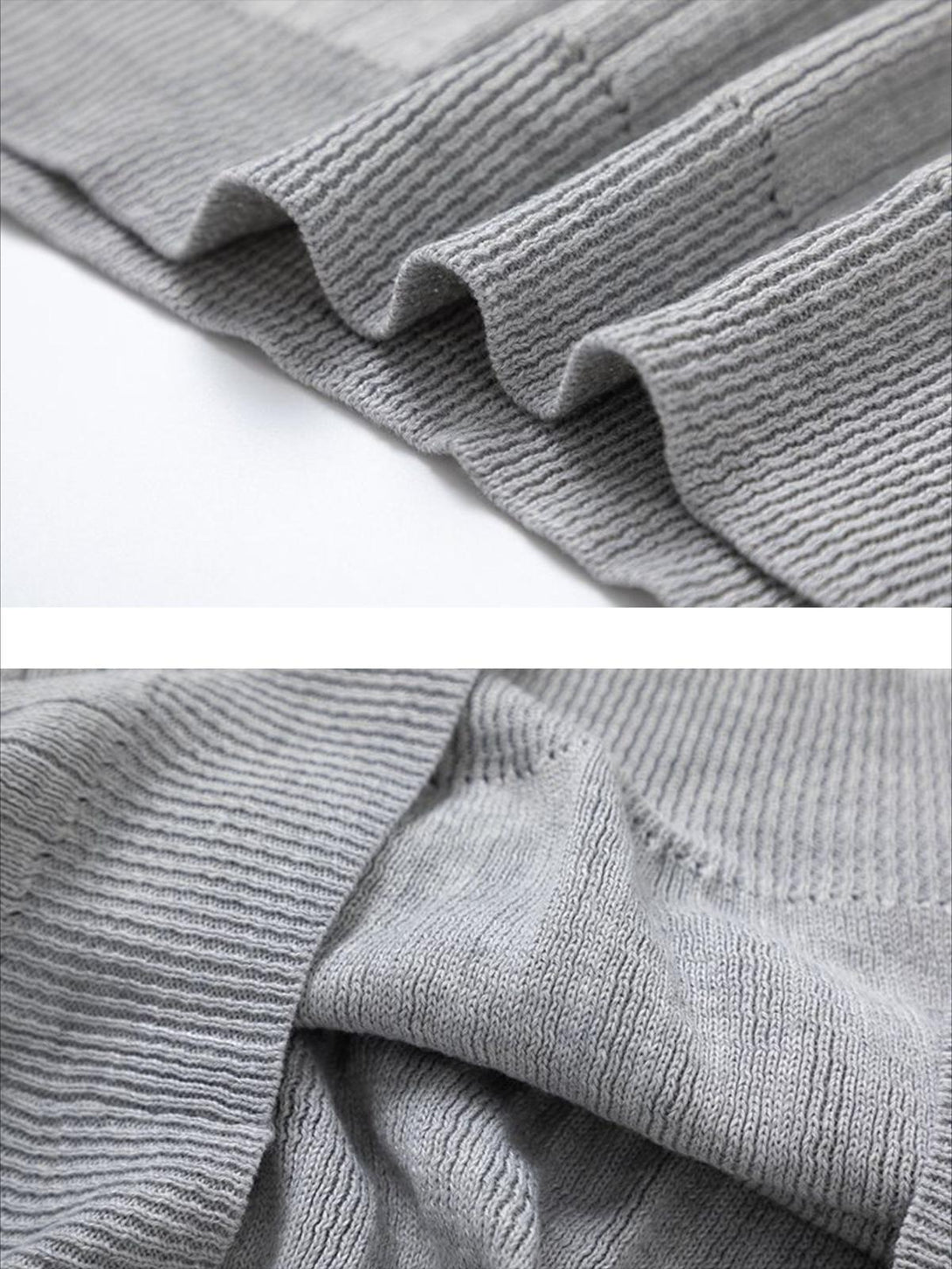 Detailed fabric and texture of a gray V-neck sweater by TALISHKO, showcasing ribbed design.