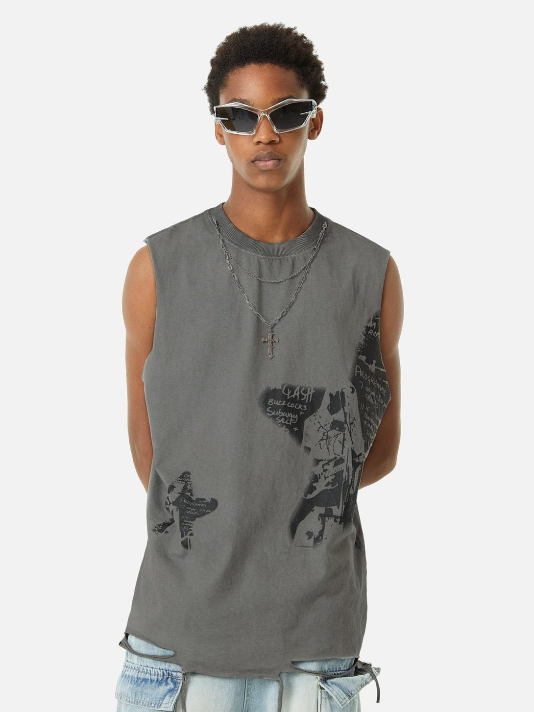 Model wearing TALISHKO hip-hop tank top with vintage print and layered necklaces.