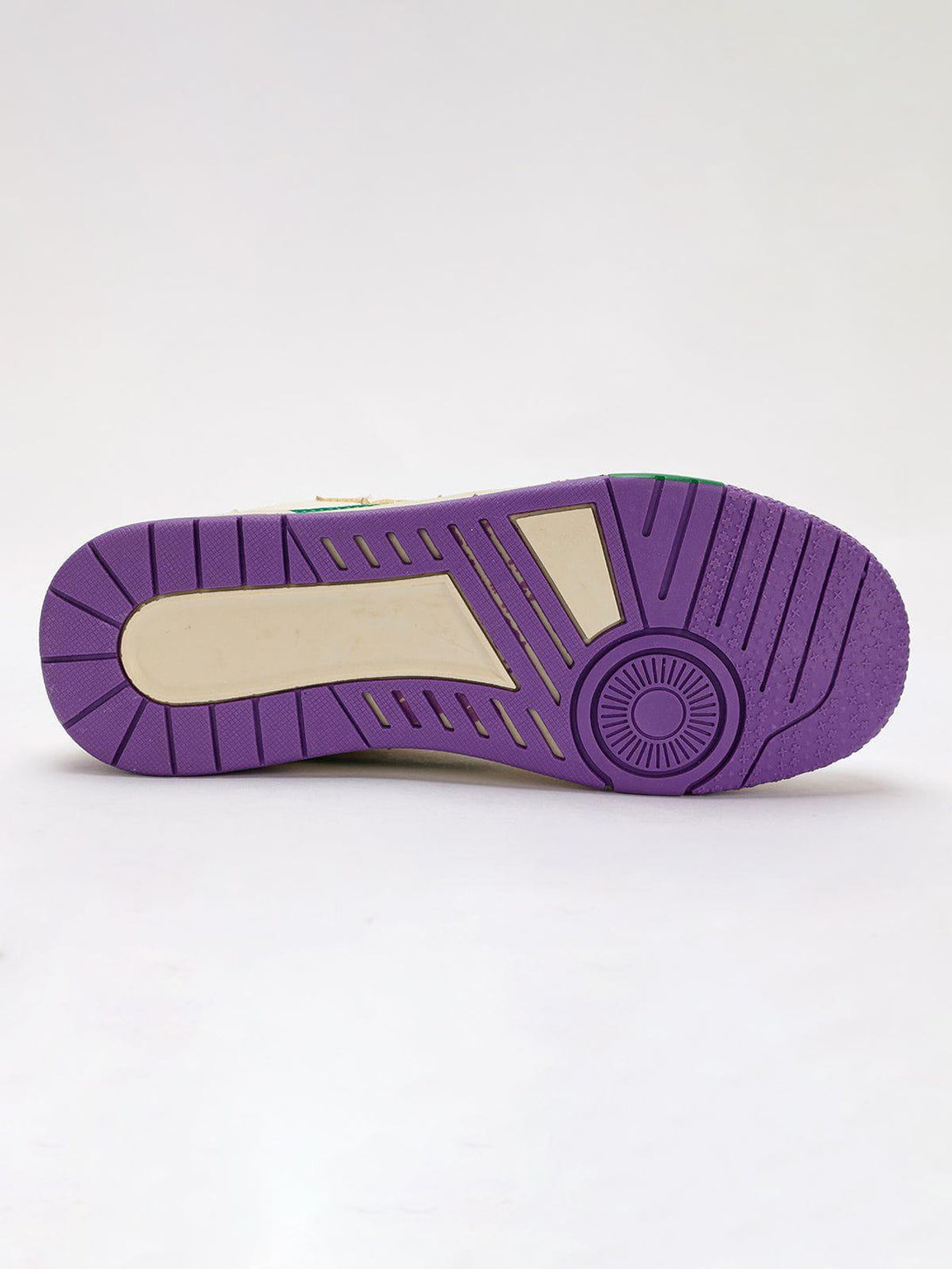 Intricate look at the purple sole design of TALISHKO vintage pentagram shoes.