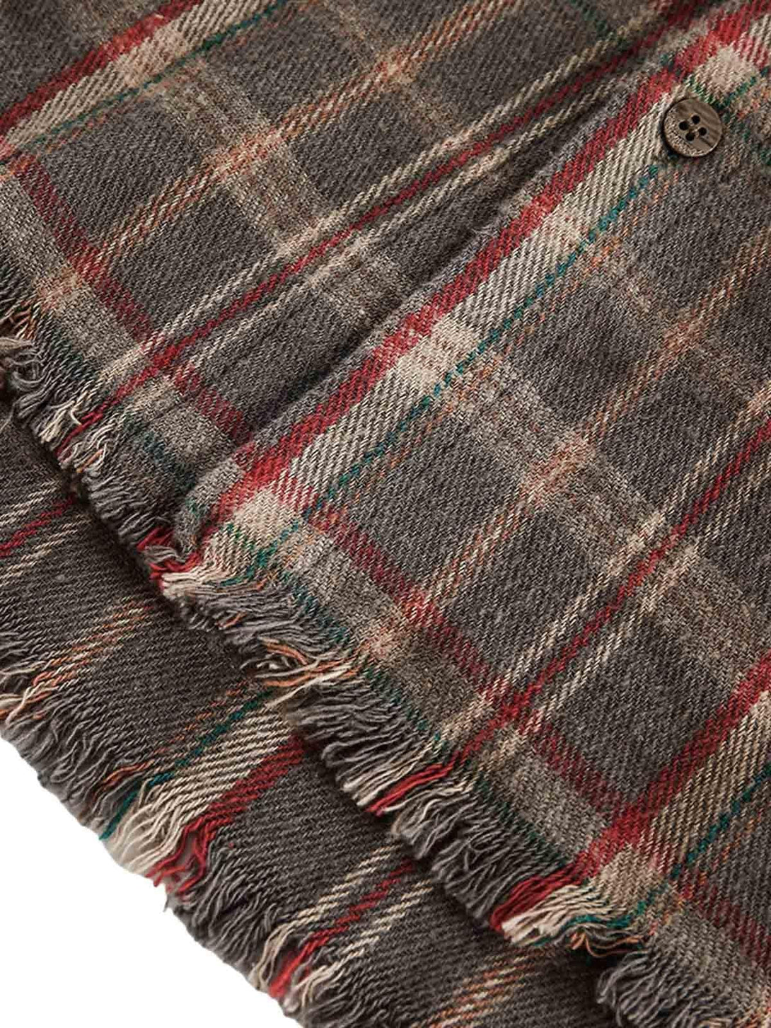Zoomed-in texture of the vintage plaid tie-dye fabric by TALISHKO, highlighting intricate detail.