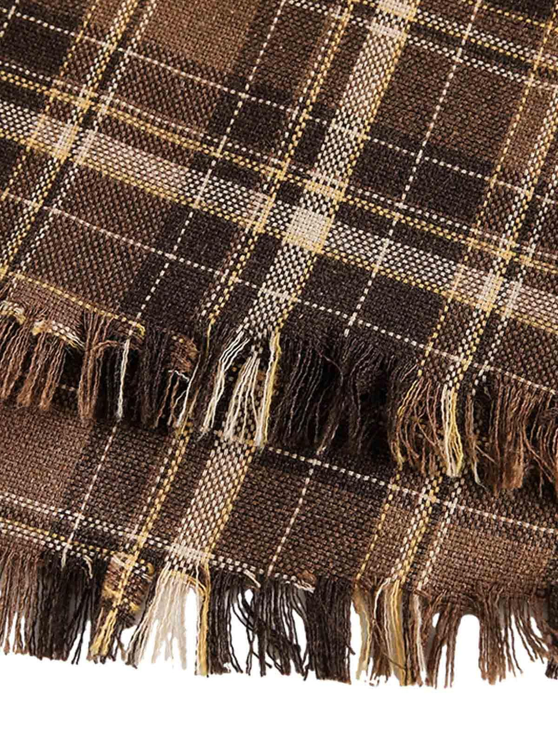 Texture and pattern of TALISHKO's brown plaid shirt, highlighting its frayed hem detail.
