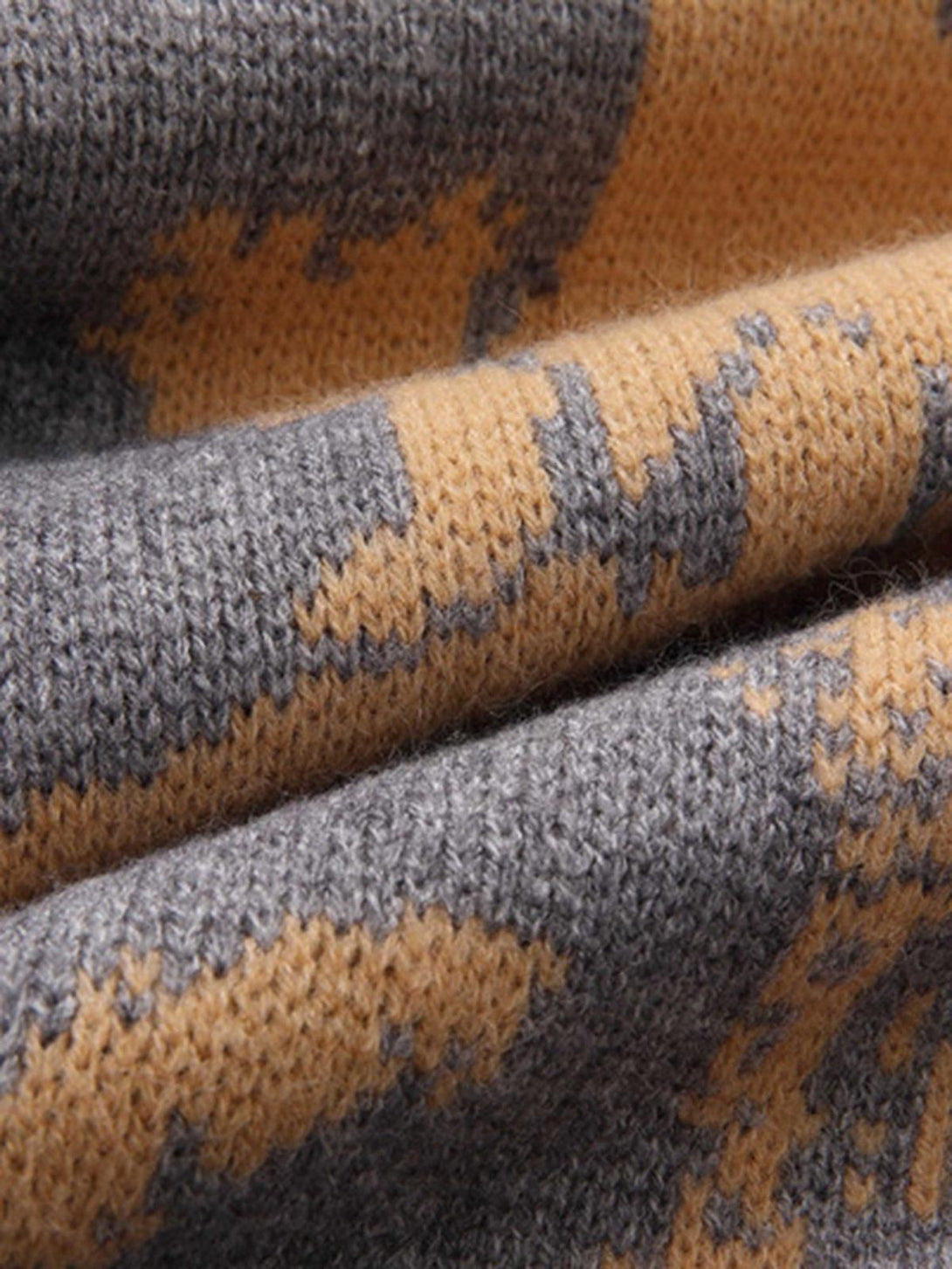 Texture and pattern showcased in a knit sweater by TALISHKO, highlighting its vintage charm.