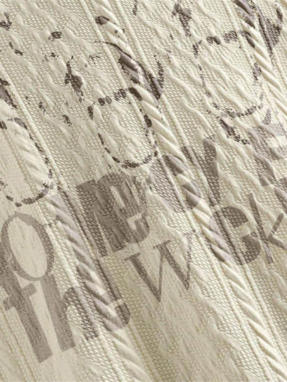 Intricate look at the vintage print texture on a polo shirt by TALISHKO.