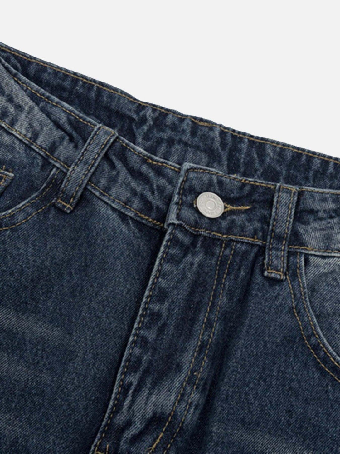 Detailed fabric and stitching of TALISHKO denim pants, highlighting vintage style.