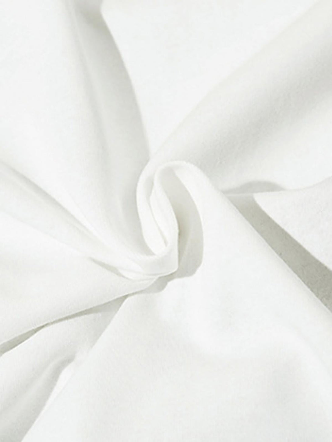 A close look at the soft fabric texture of a TALISHKO vintage star loose T-shirt.