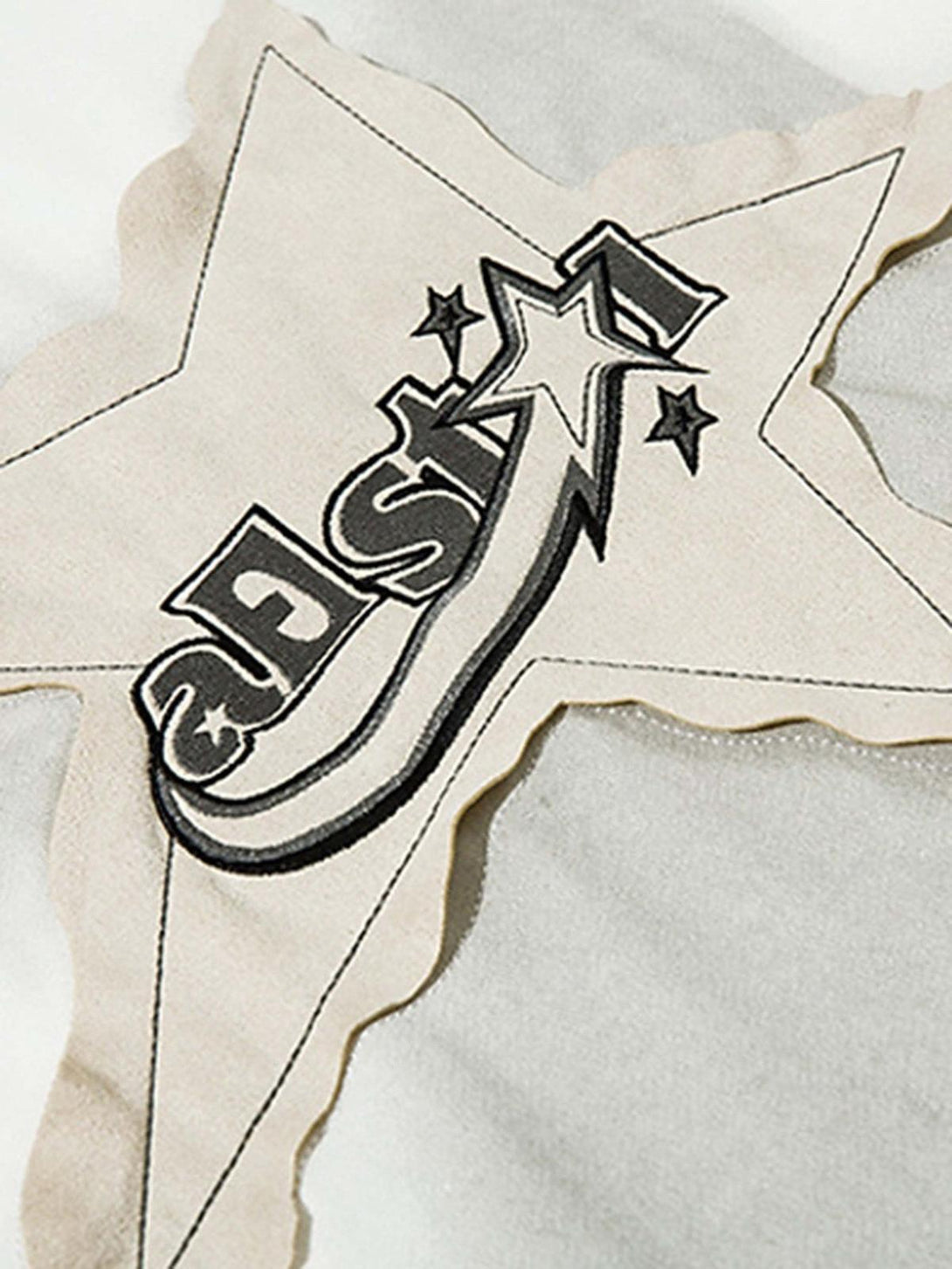 A detailed view of the star design on a TALISHKO vintage T-shirt, highlighting its unique style.