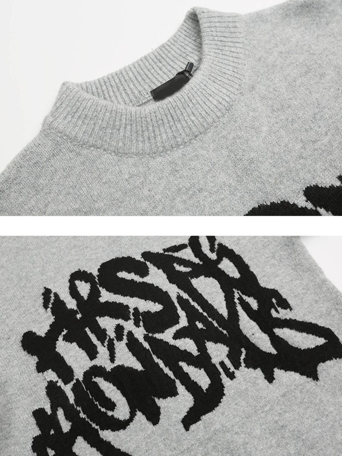 Intricate look at gray TALISHKO sweater, highlighting bold black street-style lettering.