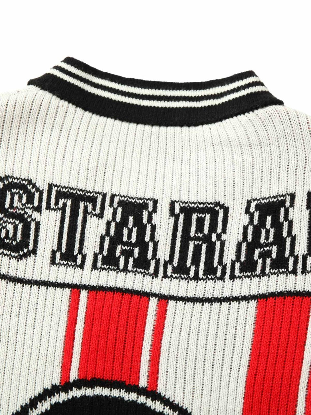 Zoomed-in view of TALISHKO vintage striped knit sweater, highlighting intricate collar details.