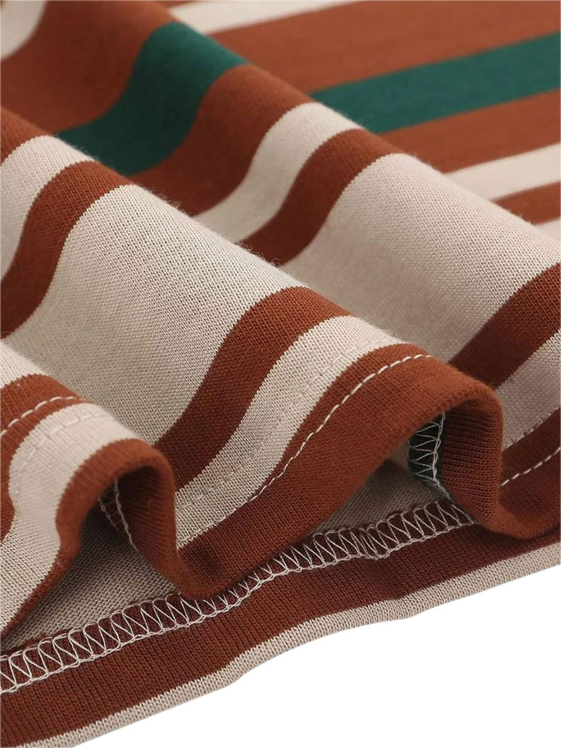 Zoomed-in texture of the vintage striped polo shirt fabric, highlighting TALISHKO's craftsmanship.