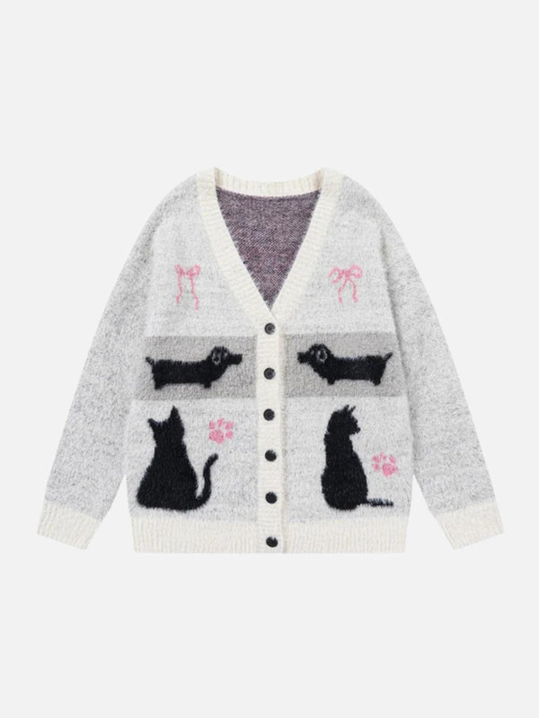 Cozy cardigan by TALISHKO featuring playful cat and dog patterns on a soft, textured knit.