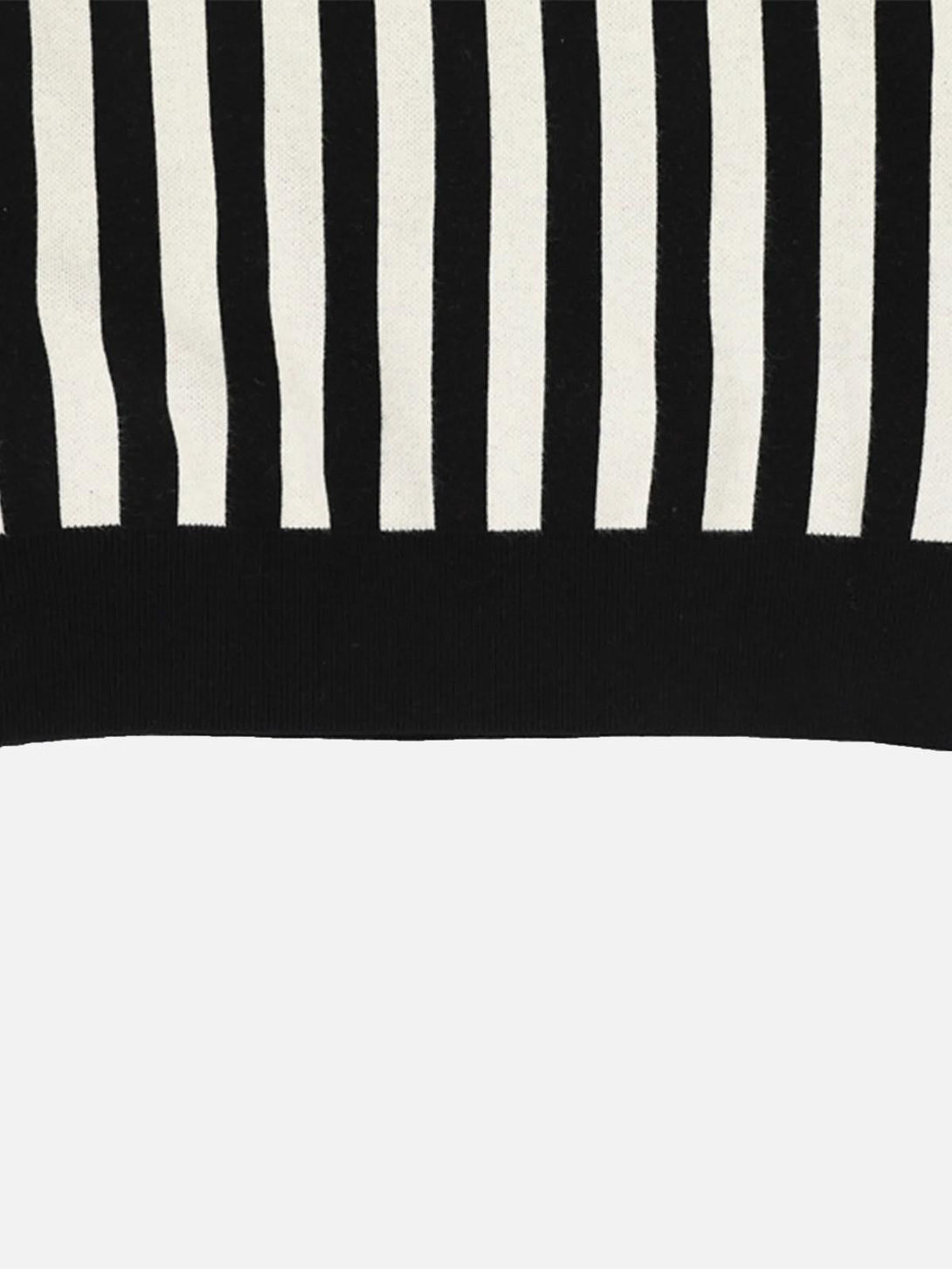 Intricate look at black and white stripes on a V-neck sweater by TALISHKO, enhancing vintage style.
