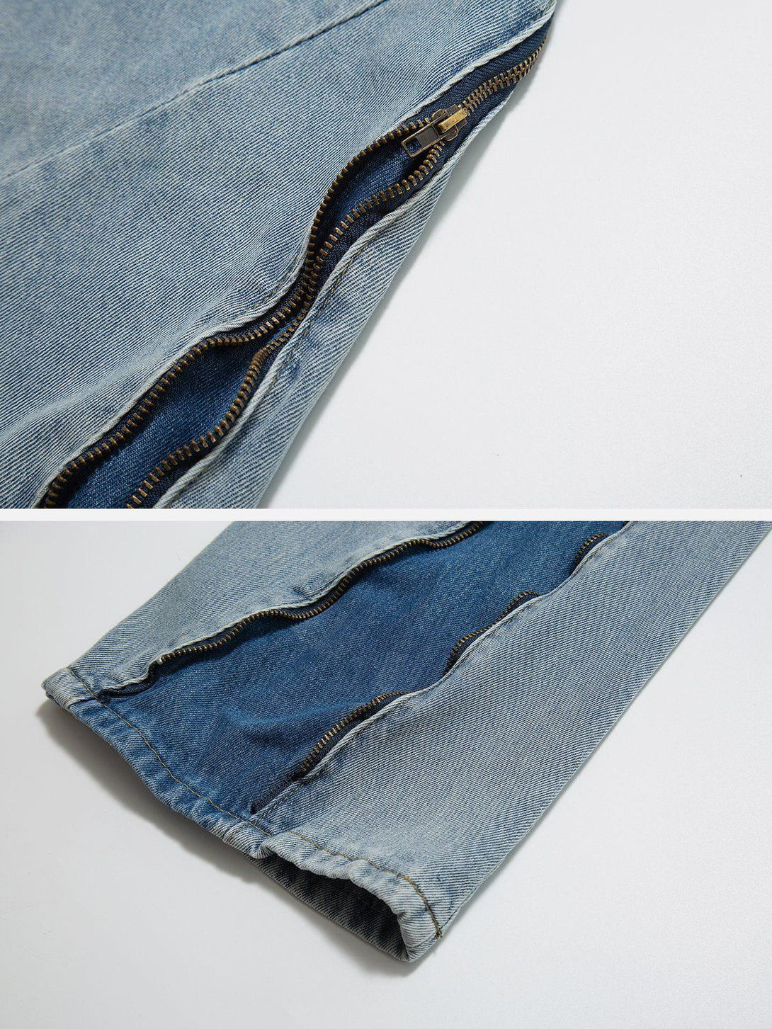 Detailed view of TALISHKO's vintage wash jeans highlighting adjustable side zippers and stitching.