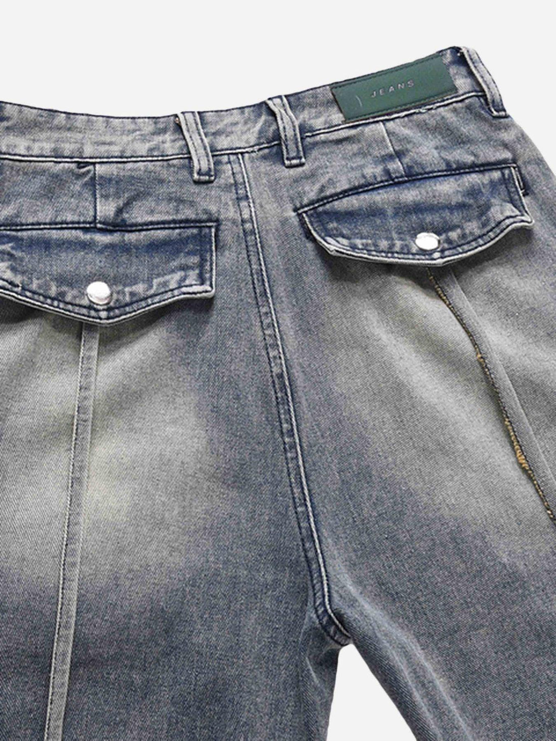 TALISHKO's vintage jeans featuring unique front cargo pockets and detailed stitching.