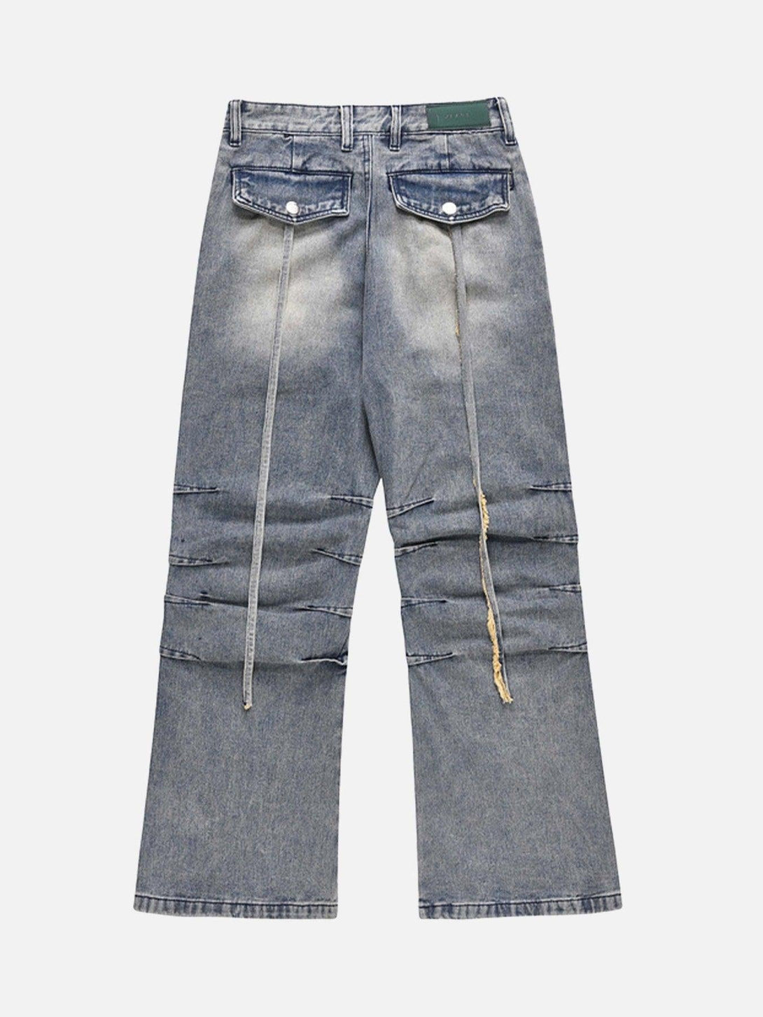 Back view of TALISHKO vintage washed jeans with frayed details and cargo pockets.