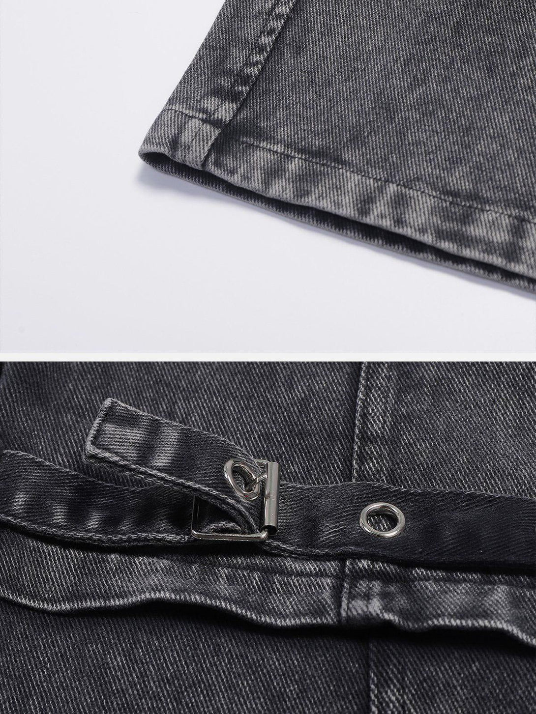 Detailed fabric and stitching of TALISHKO vintage washed denim cargo jeans with metal accents.