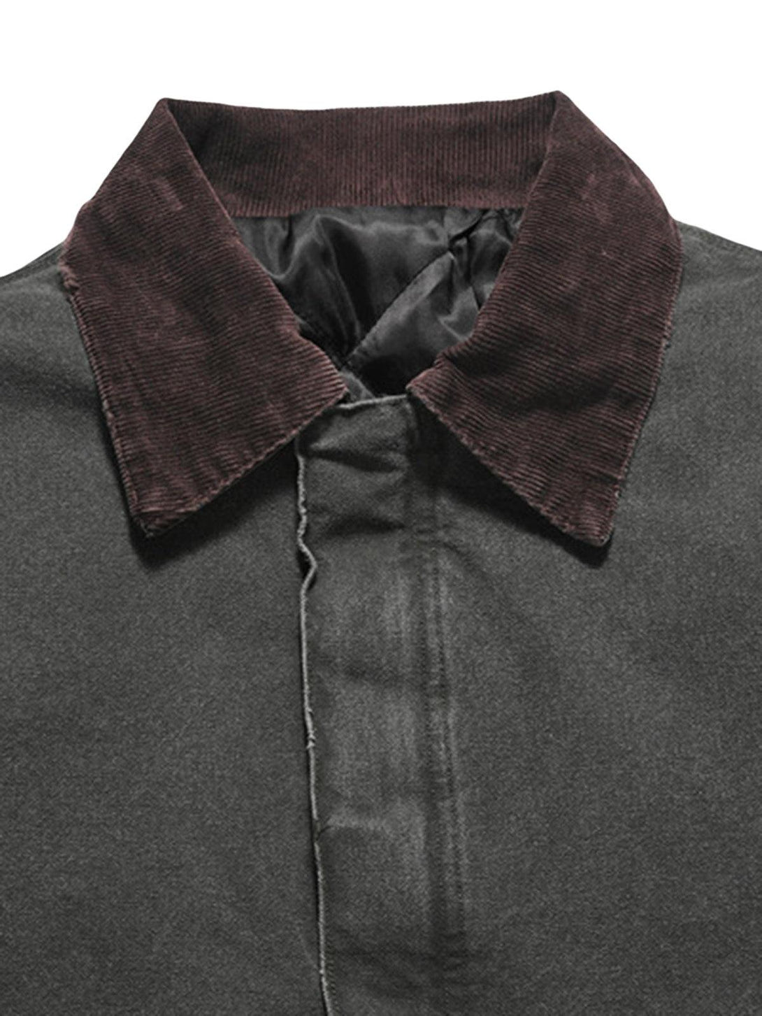 Focusing on the corduroy collar detail of TALISHKO's quilted work jacket, highlighting texture.