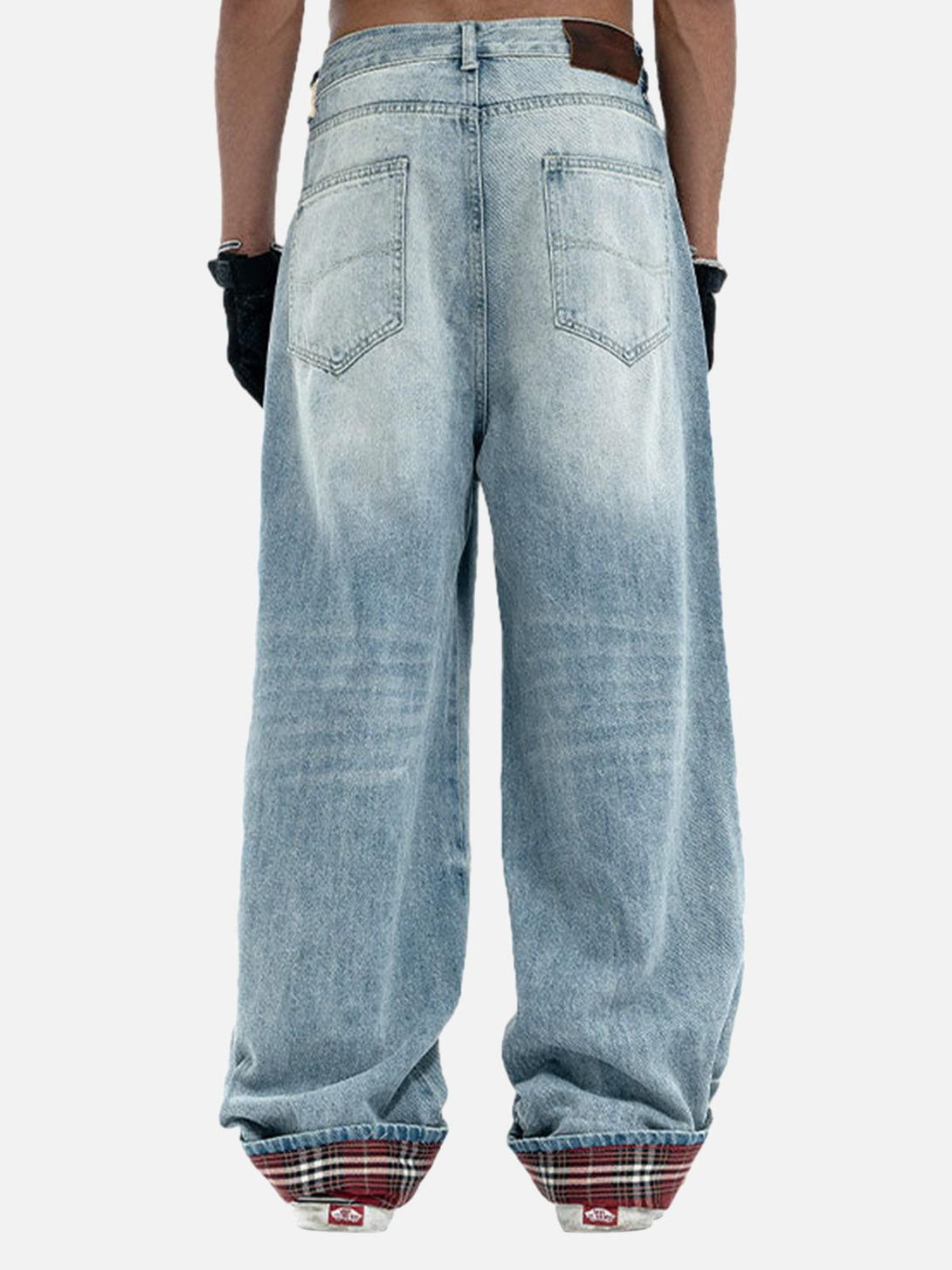 Back view of TALISHKO vintage washed baggy jeans with plaid cuffs, exuding a laid-back vibe.