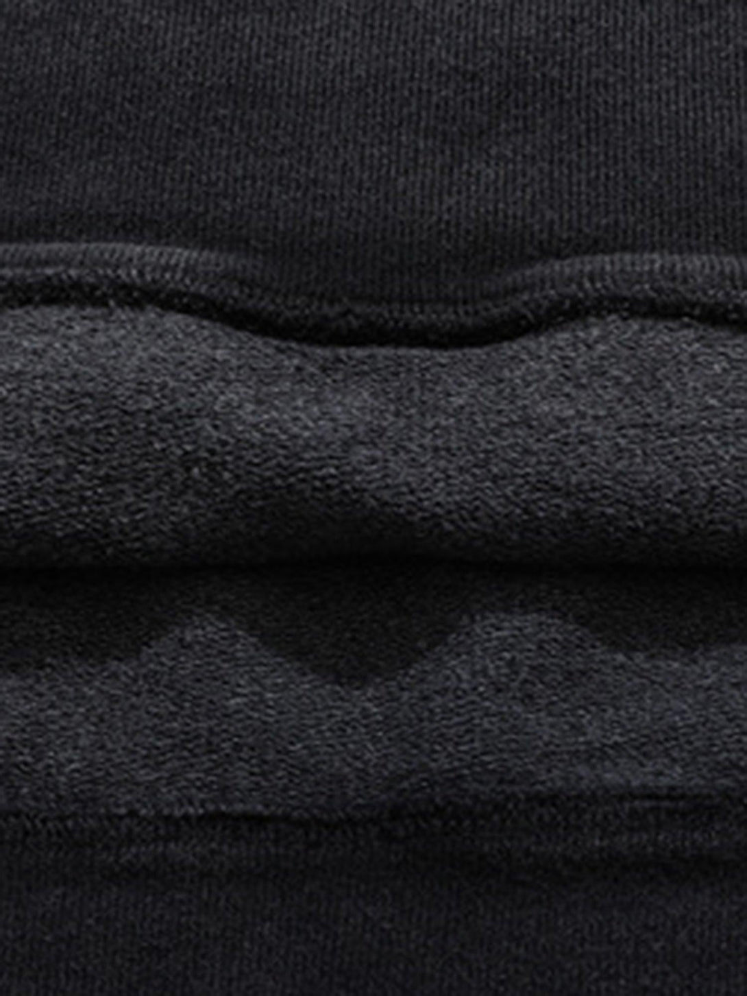 A detailed view of the soft fabric and stitching in the vintage washed hoodie by TALISHKO.