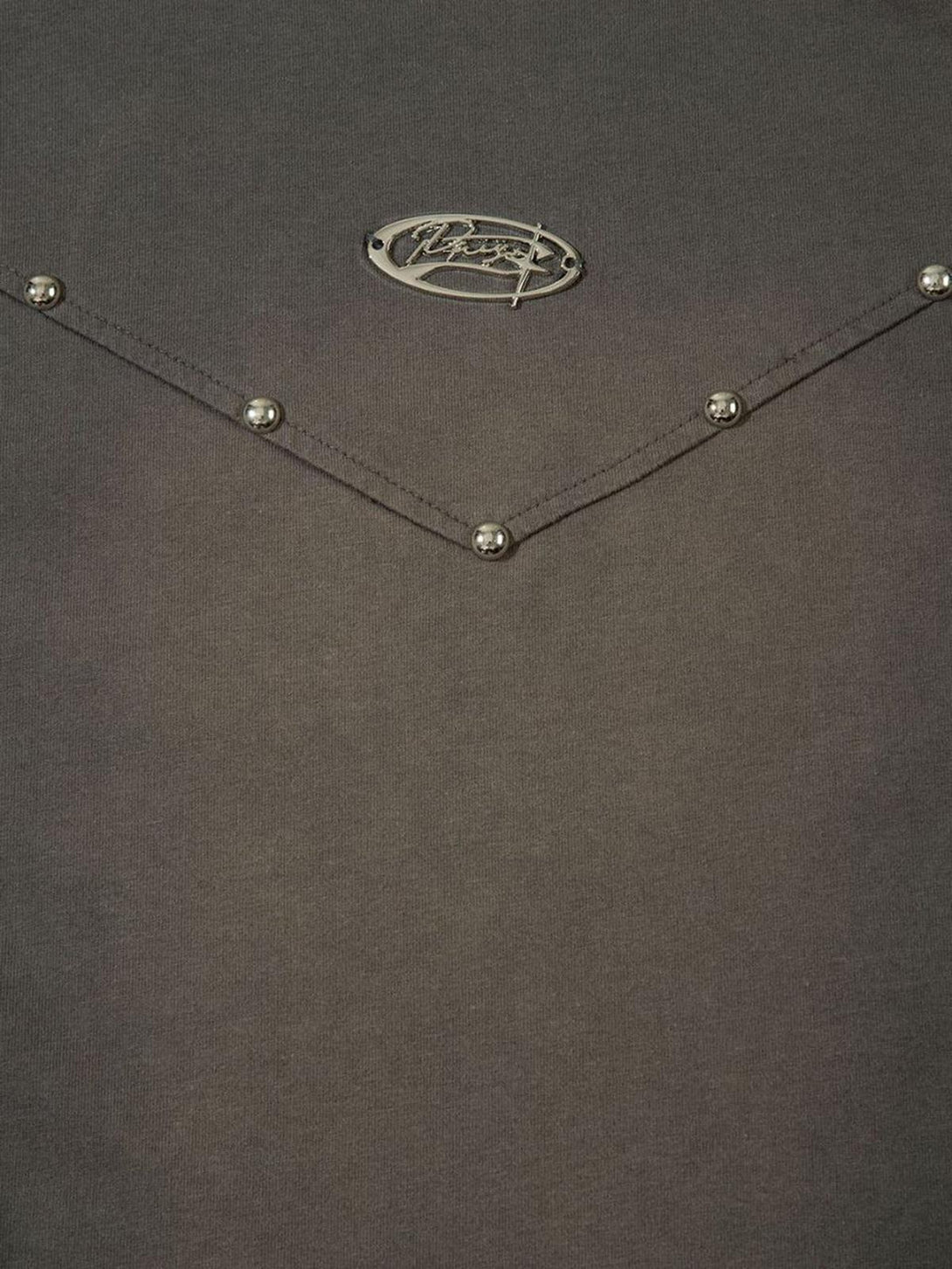 Metallic rivet details and logo design on a gray T-shirt by TALISHKO, ideal for vintage style.