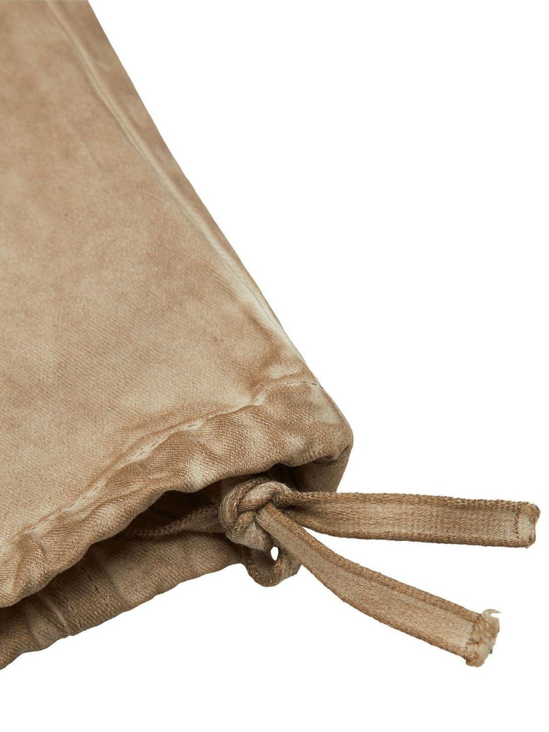 "Focusing on the drawstring detail of TALISHKO's tan vintage work pants, highlighting texture."