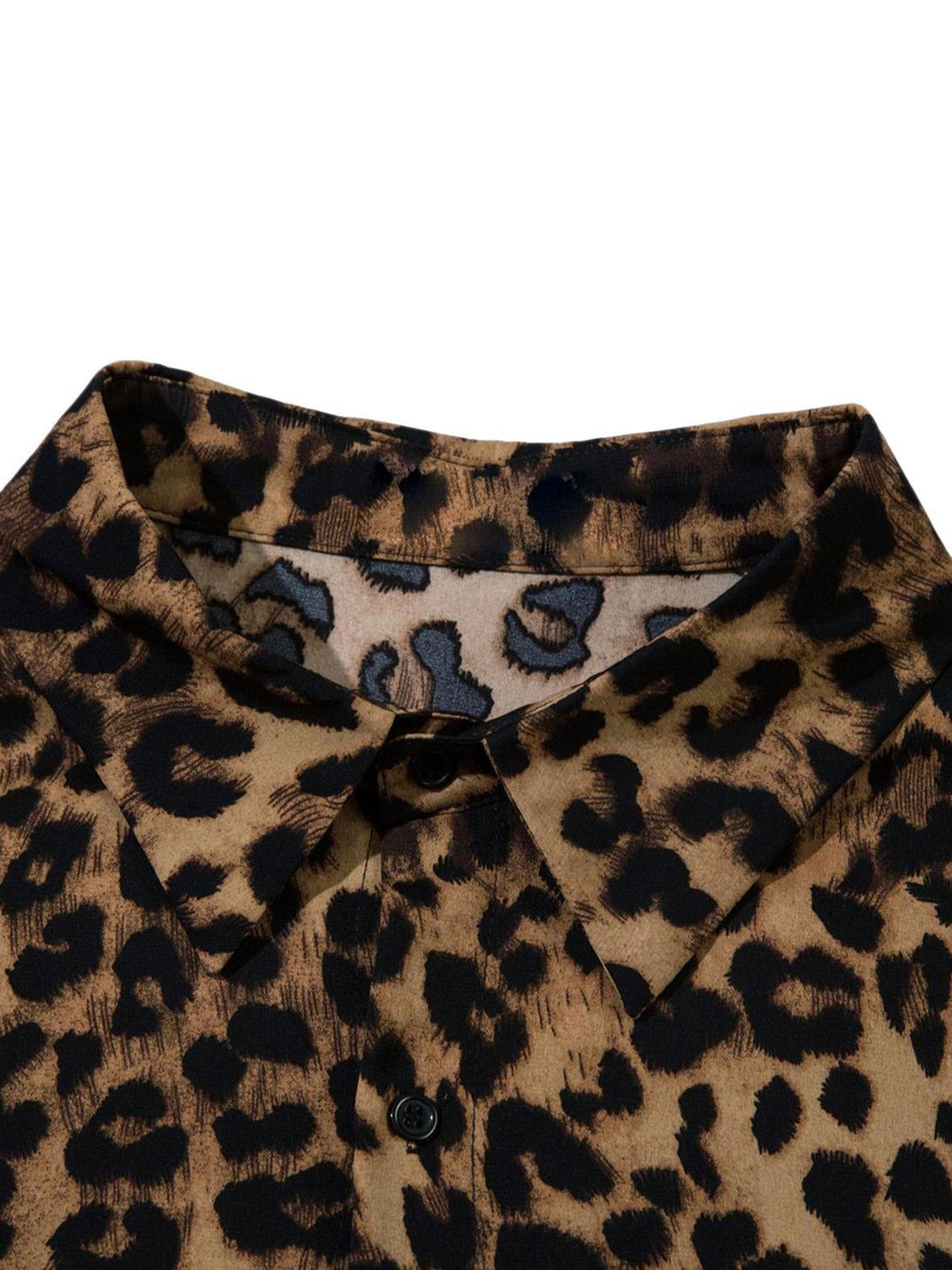 A close-up of the TALISHKO leopard print button-up shirt, highlighting its vintage wild pattern.