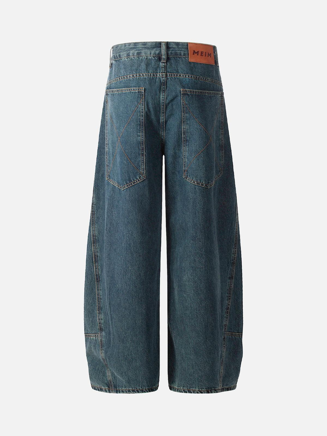 Back view of TALISHKO's washed baggy barrel jeans, featuring unique deconstructed pockets.