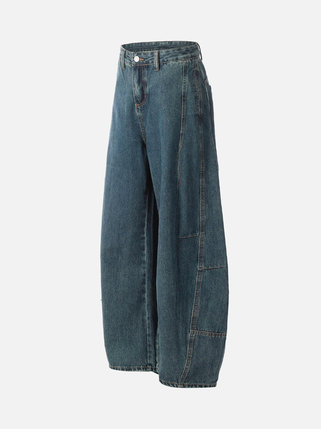 Side view of TALISHKO's washed baggy jeans highlighting the split scimitar design.