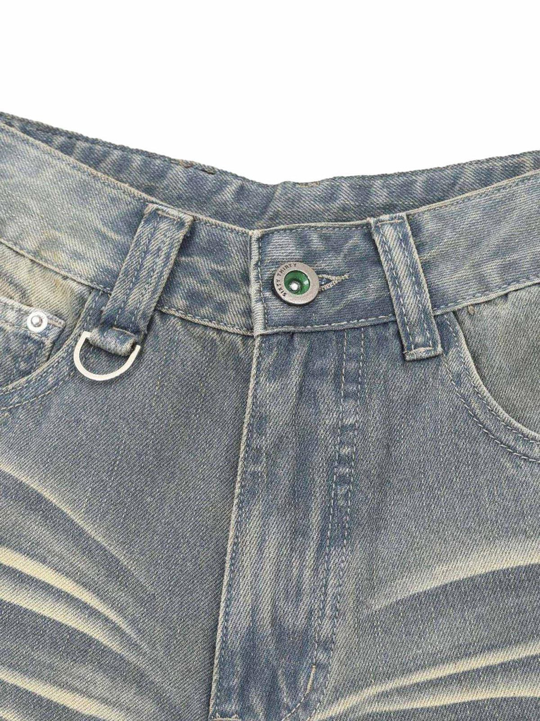 Detailed view of TALISHKO hip-hop shorts, highlighting the washed denim texture and unique button design.