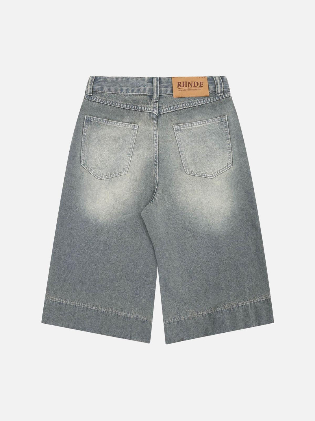 Back view of washed denim hip-hop shorts by TALISHKO, showcasing trendy faded details.