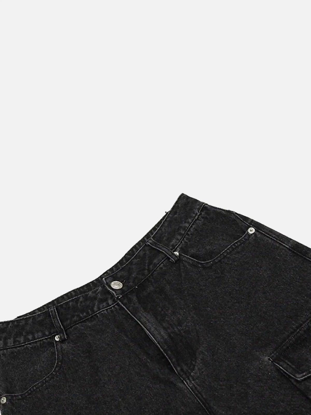 A detailed view of black washed distressed jeans by TALISHKO, highlighting the cargo pocket design.